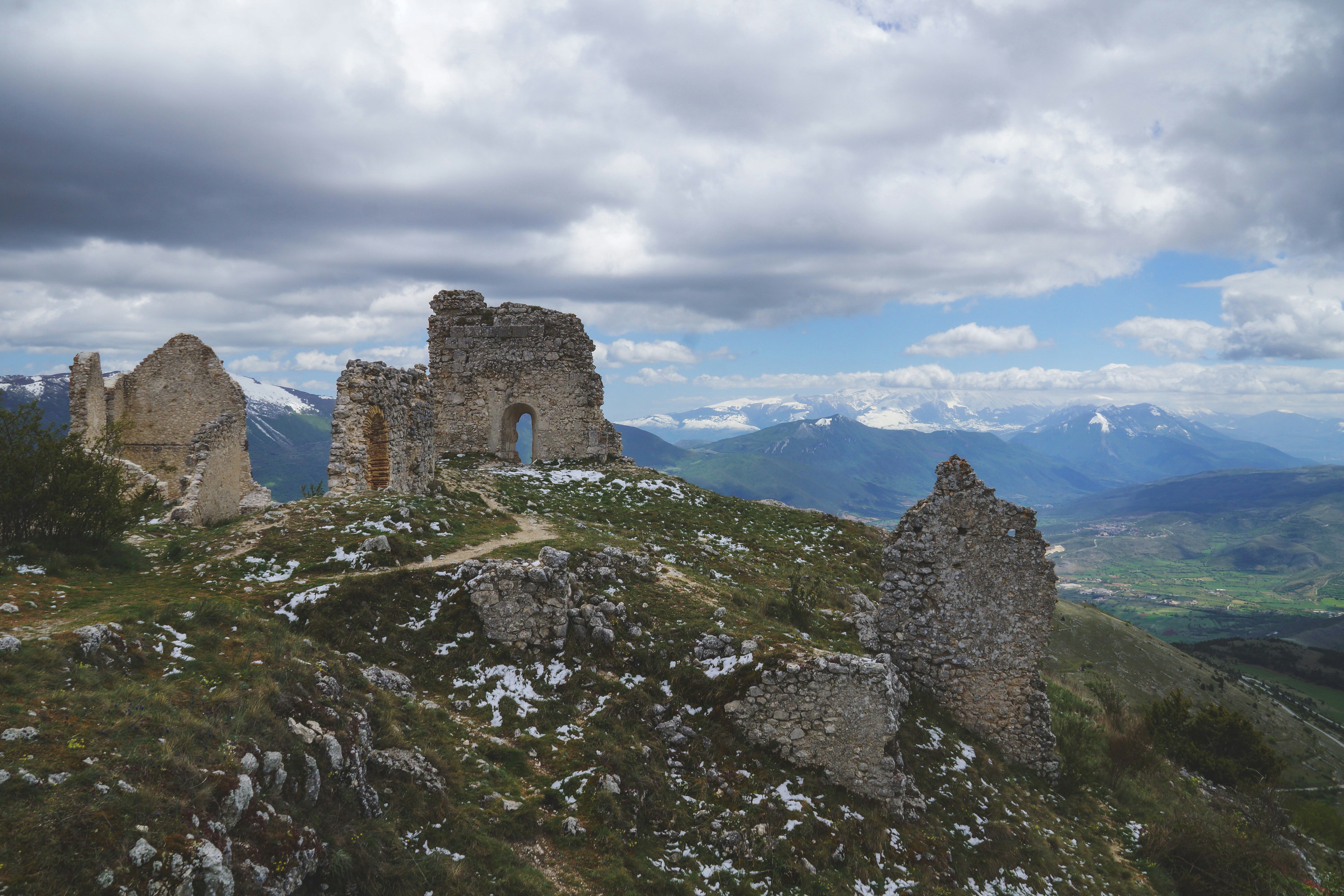 stone ruins under cloudy sky